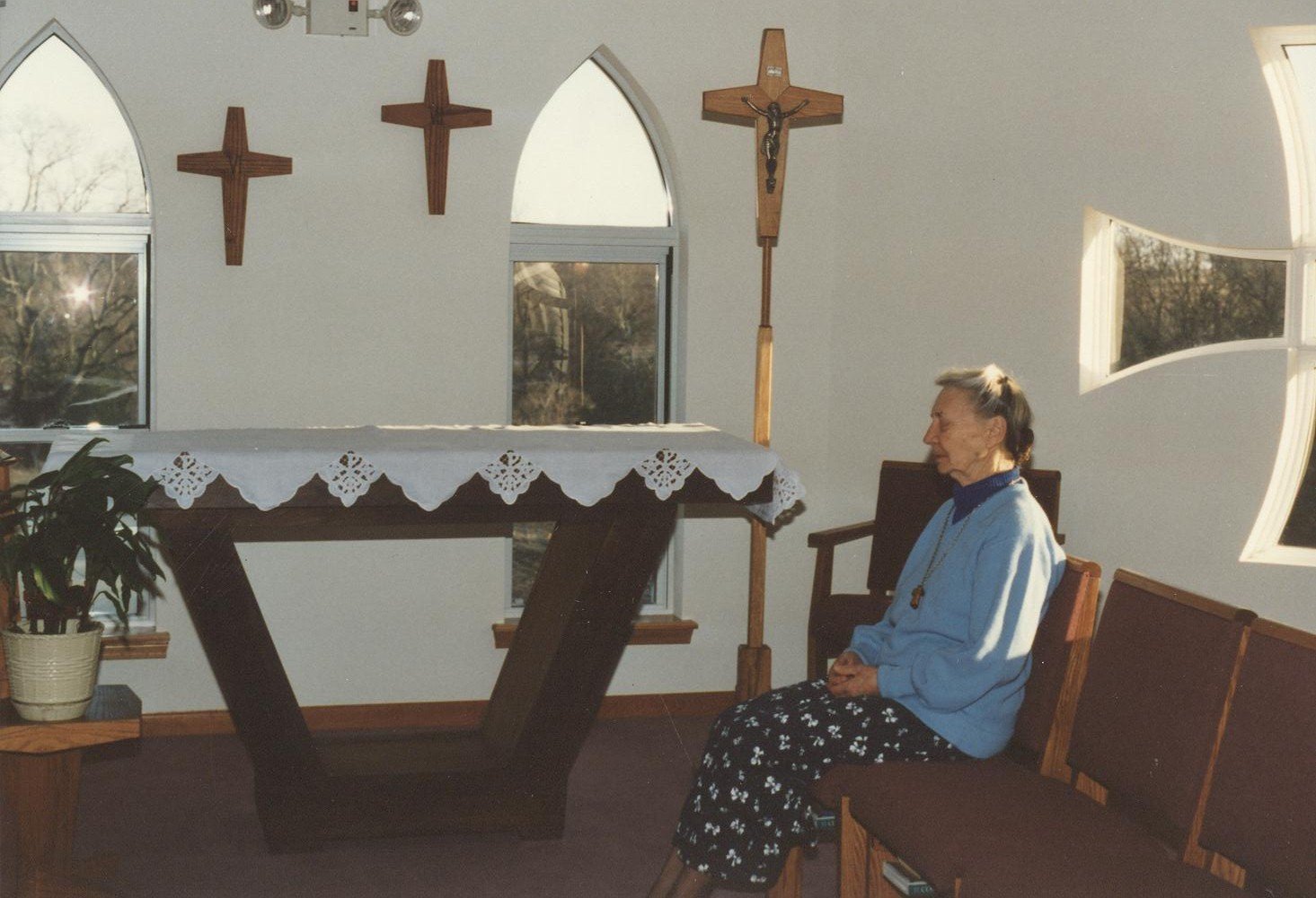 Sister Ruth Heaney OSB (1914-2007) prays in the chapel of the former Our Lady of Peace Monastery in Columbia, Missouri.